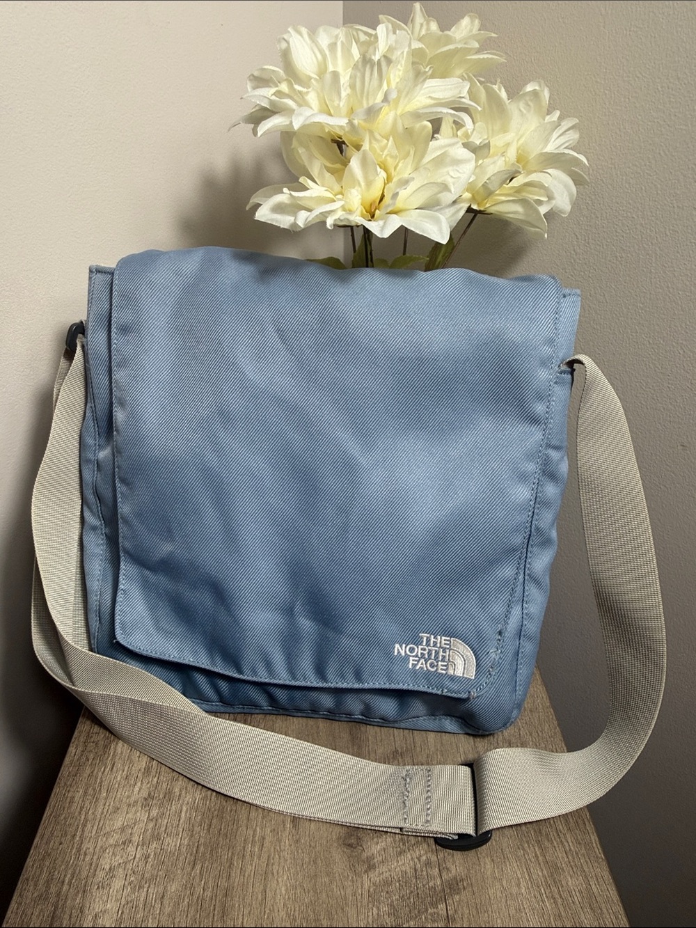 The North Face Light Blue Messenger Bag with Cream Strap